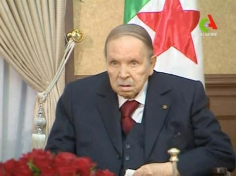 Algeria's President Abdelaziz Bouteflika looks on during a meeting with army Chief of Staff Lieutenant General Gaid Salah in Algiers, Algeria, in this handout still image taken from a TV footage released on March 11, 2019. PHOTO BY REUTERS/Algerian TV