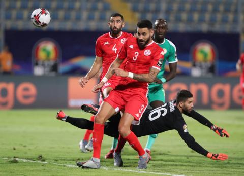 Tunisia's Dylan Bronn scores an own goal and the first for Senegal. PHOTO BY REUTERS/Suhaib Salem