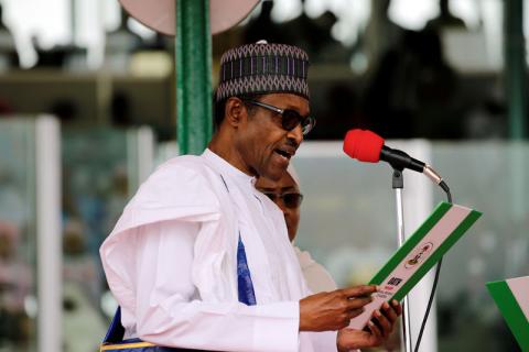 Nigerian President Muhammadu Buhari takes the oath of office during his inauguration for a second term in Abuja, Nigeria, May 29, 2019. PHOTO BY REUTERS/Afolabi Sotunde