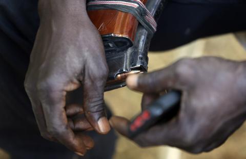 A leader of militia hunters helping the army to fight the Boko Haram insurgence in the northeast region of Nigeria, holds a magazine of bullets in his hands during an interview in Yola, Adamawa State, January 14, 2015. PHOTO BY REUTERS/Afolabi Sotunde