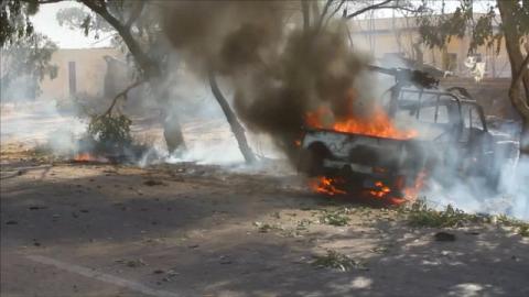 A vehicle burns as forces aligned with Libya's new unity government advance on the eastern and southern outskirts of the Islamic State stronghold of Sirte, in this still image taken from video, June 9, 2016. PHOTO BY REUTERS