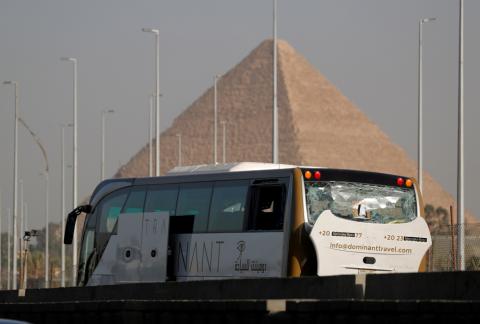 A damaged bus is seen at the site of a blast near a new museum being built close to the Giza pyramids in Cairo, Egypt, May 19, 2019. PHOTO BY REUTERS/Amr Abdallah Dalsh