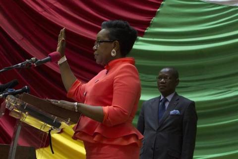 The new parliamentary-elected interim President of the Central African Republic Catherine Samba-Panza swears an oath during her swearing-in ceremony at the National Assembly in the capital Bangui