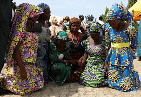 Newly released 82 Chibok school girls pray as they reunite with their families in Abuja, Nigeria, May 20, 2017. PHOTO BY REUTERS/Afolabi Sotunde 