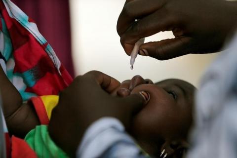 A child is given a dose of polio vaccine at an immunisation health centre, in Maiduguri, Borno State, Nigeria, August 29, 2016. PHOTO BY REUTERS/Afolabi Sotunde