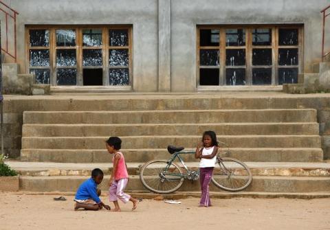 Children play outside the Jesuit-run Saint Michel Fanantenana Primary School in the village of Andriampamaky, around 50 km (31 miles) north of Madagascar's capital city Antananarivo April 21, 2012. PHOTO BY REUTERS/Darrin Zammit Lupi 