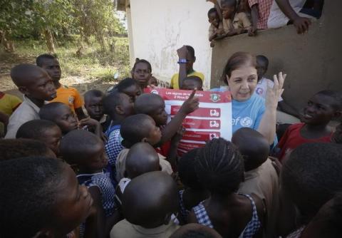 United Nations Children's Fund (UNICEF) Ivory Coast Representative Adele Khudr speaks to children during an Ebola awareness drive in Toulepleu, at the border of Liberia, in western Ivory Coast, November 4, 2014. PHOTO BY REUTERS/Thierry Gouegnon