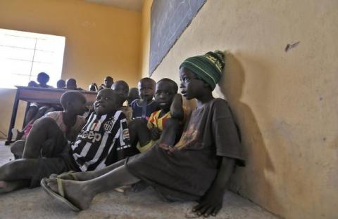 Children displaced as a result of Boko Haram attack in the northeast region of Nigeria, attend a class at Maikohi secondary school camp for internally displaced persons (IDP) in Yola, Adamawa State, January 13, 2015. PHOTO BY REUTERS/Afolabi Sotunde