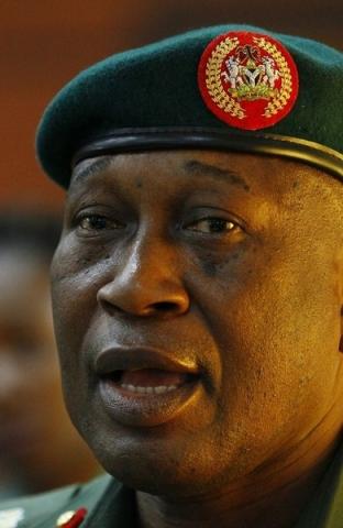 Nigeria's Defence spokesman Brigadier General Chris Olukolade speaks to the media at the military headquarters in Abuja