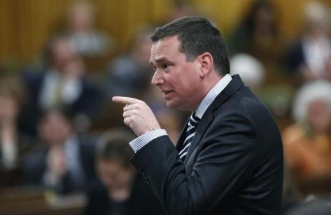 Canada's Industry Minister Christian Paradis speaks during Question Period in the House of Commons on Parliament Hill in Ottawa