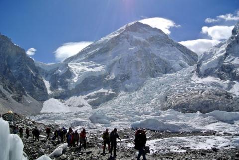 Climbers walk towards their helicopter (not seen) after their Mount Everest expeditions were cancelled in Solukhumbu district, April 27, 2014. PHOTO BY REUTERS/Phurba Tenjing Sherpa