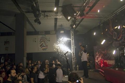 A member of the Romanian metal band 'Goodbye to Gravity' performs as firewoks erupt on the stage of a nightclub, before a fire broke out on Friday, in Bucharest, Romania, October 31, 2015. PHOTO BY REUTERS/Vlad Busca