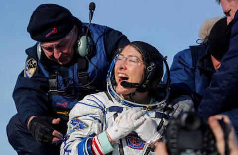 NASA astronaut Christina Koch reacts shortly after landing of the Russian Soyuz MS-13 space capsule in a remote area southeast of Zhezkazgan in the Karaganda region of Kazakhstan, February 6, 2020. PHOTO BY REUTERS/Sergei Ilnitsky/Pool