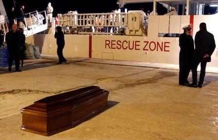 A coffin that will be used to contain the body of a migrant who died while trying to reach Italy is seen at the Sicilian harbour of Augusta, March 4, 2015. PHOTO BY REUTERS/Antonio Parrinello