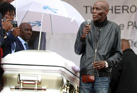 Zimbabwean musician Oliver Mtukudzi sings at the funeral of Movement for Democratic Change (MDC) leader, Morgan Tsvangirai, in Buhera, Zimbabwe, February 20, 2018. PHOTO BY REUTERS/Philimon Bulawayo