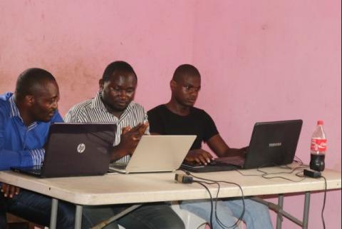 Young startup promoters work on their computers in New Bonako village, Cameroon, March 28, 2017. PHOTO BY REUTERS/Stringer