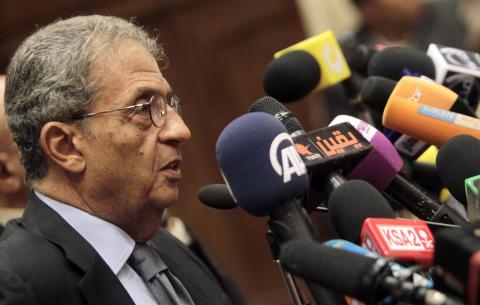 Amr Moussa, chairman of the committee to amend the country's constitution speaks at a news conference at the Shura Council in Cairo