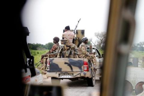 A Nigerian army convoy vehicle drives ahead with an anti-aircraft gun, on its way to Bama, Borno State, Nigeria, August 31, 2016. PHOTO BY REUTERS/Afolabi Sotunde