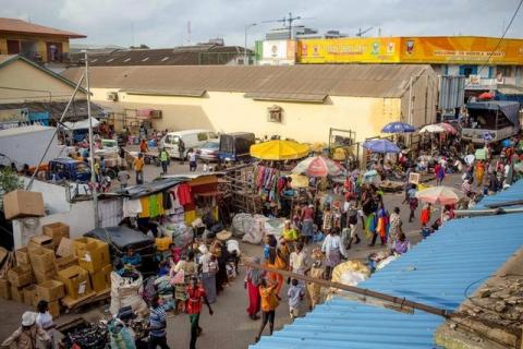 Customers peruse goods at Makola market in Accra, Ghana, June 15, 2015. PHOTO BY REUTERS/Francis Kokoroko