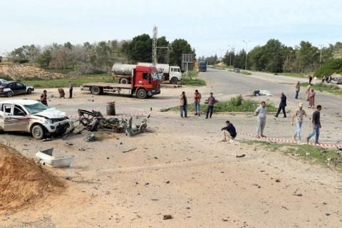 General view of damage at the scene of an explosion at the Mislattah checkpoint near Khoms, on the coast road between Tripoli and Misrata Libya, November 24, 2015. PHOTO BY REUTERS/Stringer