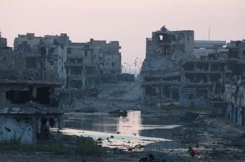 Damaged homes are seen after clashes between members of the Libyan pro-government forces and Shura Council of Libyan Revolutionaries, in a file photo. PHOTO BY REUTERS/Stringer