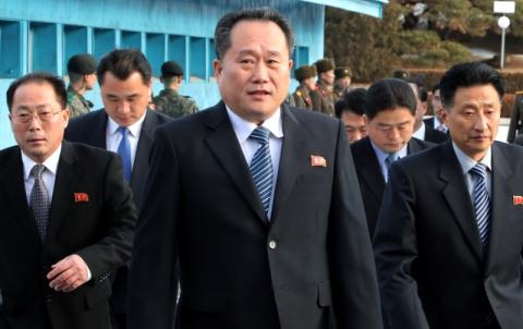 North Korean delegation led by Ri Son Gwon, Chairman of the Committee for the Peaceful Reunification of the Country (CPRC) of DPRK, cross the concrete border to attend their meeting at the truce village of Panmunjom in the demilitarised zone separating the two Koreas, South Korea, January 9, 2018. PHOTO BY REUTERS/Korea Pool
