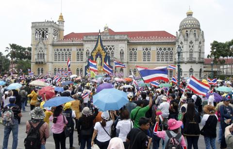 Anti-government protesters from the Network of Students and People for Thailand's Reform take part in a rally at Government House in Bangkok