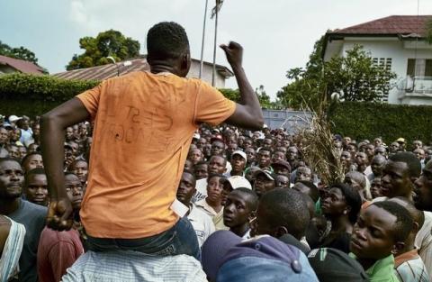 Supporters of the Congolese main opposition Union for Democracy and Social Progress (UDPS) gather outside the residence of the late veteran opposition leader Etienne Tshisekedi in the Limete Municipality in Kinshasa, Democratic Republic of Congo, March 28, 2017. PHOTO BY REUTERS/Robert Carrubba