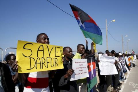 Demonstrators most of whom from Darfur and Sudan hold placards as they protest against human rights violation in front of the American Embassy in Tel Aviv, February 3, 2016. PHOTO BY REUTERS/Baz Ratner