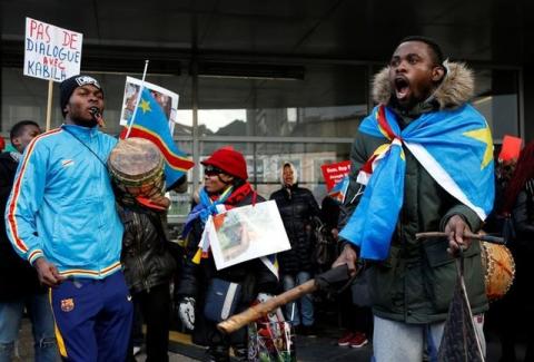 Demonstrators chant slogans against plans of Democratic Republic of Congo's President Joseph Kabila to stay in office past the end of his term, during a protest in central Brussels, Belgium, December 19, 2016. PHOTO BY REUTERS/Francois Lenoir