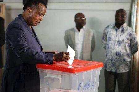 Republic of Congo President Denis Sassou Nguesso votes at a polling station in Brazzaville, Congo, October 25, 2015. PHOTO BY REUTERS/Roch Baku