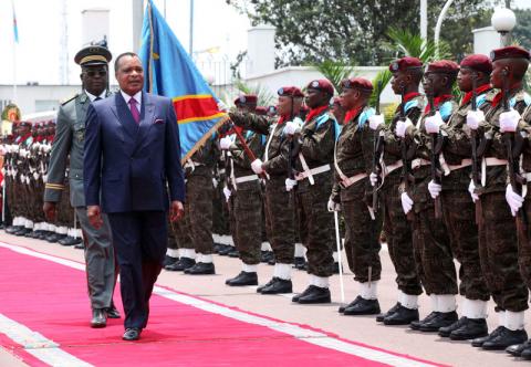 Republic of Congo President Denis Sassou Nguesso inspects a guard of honour before meeting Democratic Republic of Congo's President Joseph Kabila at the State House in Kinshasa, Democratic Republic of Congo, February 14, 2018. PHOTO BY REUTERS/Kenny Katombe
