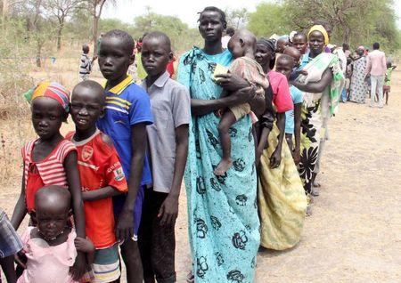 Residents displaced due to the recent fighting between government and rebel forces in the Upper Nile capital Malakal wait at a World Food Program (WFP) outpost where thousands have taken shelter in Kuernyang Payam, South Sudan, May 2, 2015. PHOTO BY REUTERS/Denis Dumo