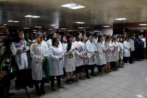 Cuban doctors take part in a welcoming ceremony at the Jose Marti International Airport after arriving from Brazil, in Havana, Cuba, November 23, 2018. PHOTO BY REUTERS/Fernando Medina