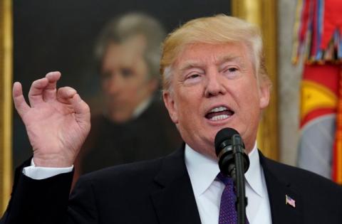 U.S. President Donald Trump gestures as he speaks at the White House in Washington, U.S., November 27, 2017. PHOTO BY REUTERS/Kevin Lamarque