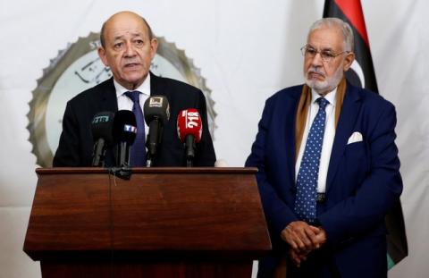 French Foreign Minister Jean-Yves Le Drian attends a joint news conference with Libya's Foreign Minister Mohamed Taher Siala, in Tripoli, Libya, December 21, 2017. PHOTO BY REUTERS/Ismail Zitouny