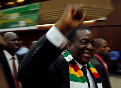 Zimbabwean President Emmerson Mnangagwa greets supporters of his ruling Zimbabwe African National Union – Patriotic Front (ZANU–PF) party at a rally in Harare, Zimbabwe, March 7, 2018. PHOTO BY REUTERS/Philimon Bulawayo