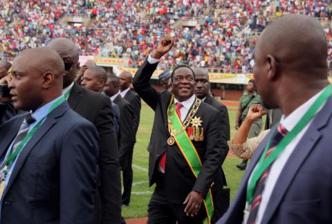 Zimbabwe's President Emmerson Mnangagwa waves to crowds gathered for Independence Day celebrations in Harare, Zimbabwe, April 18, 2019. PHOTO BY REUTERS/Philimon Bulawayo