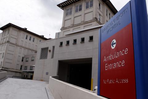 Emory University Hospital after an ambulance carrying American doctor Kent Brantly, who has the Ebola virus, arrived via Dobbins Air Reserve Base in Atlanta, Georgia