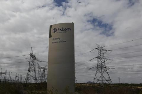 Pylons carry electricity from a sub-station of state power utility Eskom outside Cape Town in this picture taken March 20, 2016. PHOTO BY REUTERS/Mike Hutchings