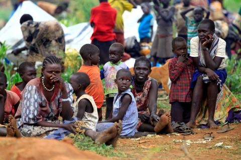 South Sudanese families displaced by fighting, queue for vaccination in Lamwo after fleeing fighting in Pajok town across the border in northern Uganda, April 5, 2017. PHOTO BY REUTERS/James Akena