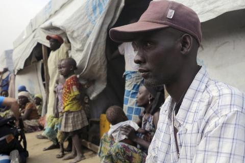 Emmanuel Ali Talka, 36, sits in front of his tent with his family of six at the Minawao refugee camp, northern Cameroon, February 18, 2015. PHOTO BY REUTERS/Bate Felix Tabi Tabe