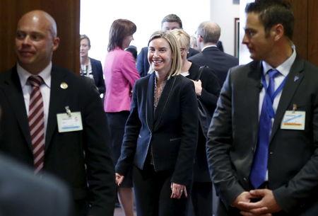 European Union foreign policy chief Federica Mogherini (C) arrives at a joint meeting of European Union foreign and defence ministers at the EU Council in Brussels, Belgium, May 18, 2015. PHOTO BY REUTERS/Francois Lenoir