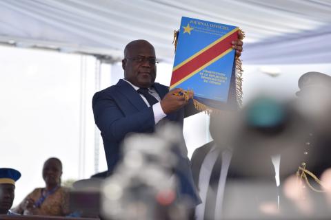 Felix Tshisekedi holds up the constitution during his presidential the inauguration ceremony in Kinshasa, Democratic Republic of Congo, January 24, 2019. PHOTO BY REUTERS/Olivia Acland