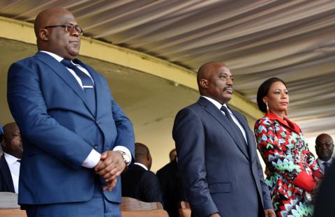 Democratic Republic of Congo's outgoing President Joseph Kabila and his successor Felix Tshisekedi take part in the latter's inauguration ceremony in Kinshasa, Democratic Republic of Congo, January 24, 2019. PHOTO BY REUTERS/ Olivia Acland