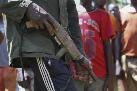 An anti-Balaka soldier holds a handmade gun as former child soldiers wait to be released in Bambari, Central African Republic, May 14, 2015. PHOTO BY REUTERS/Emmanuel 