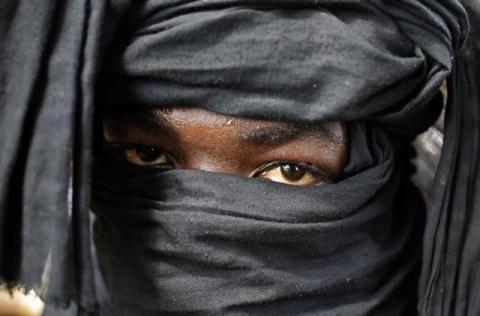 A Seleka fighter wears a black scarf as he patrols in the town of Kuango, close to the border of the Democratic Republic of Congo in a file picture. PHOTO BY REUTERS/Goran Tomasevic