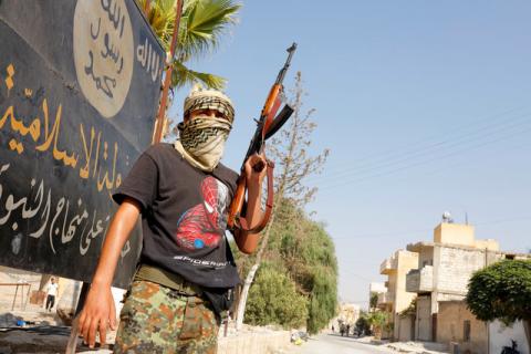 A member of the Turkish-backed Free Syrian Army (FSA) patrols in the border town of Jarablus, Syria, August 31, 2016. PHOTO BY REUTERS/Umit Bektas