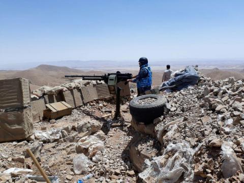 Fighters from Syrian army units and Hezbollah on the western mountains of Qalamoun, near Damascus. PHOTO BY REUTERS/SANA