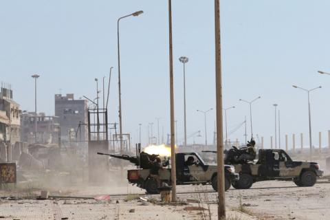 Clashes between special forces of the Libyan army and Islamist militants in Benghazi. PHOTO BY REUTERS/Esam Omran Al-Fetori